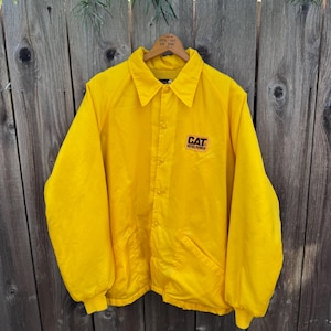 CAT Diesel Fleece Lined Snap Front Coach Jacket Windbreaker Yellow Swingster With Removable Hood Union Made in USA Size Large
