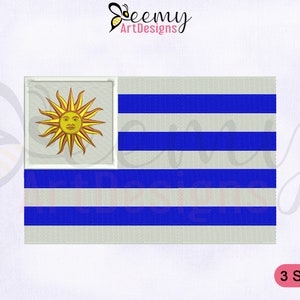 Pode incluir: Um desenho bordado da bandeira do Uruguai. A bandeira é azul e branca com um sol dourado no canto superior esquerdo. O sol tem um rosto humano no centro. O texto "3 SIZES" está no canto inferior direito.