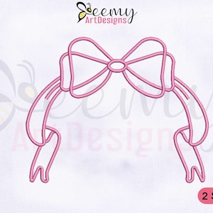 May include: Pink embroidered bow design with long, flowing ribbons. The design includes the text "Beemy Art Designs" and "2 SIZES". This design is suitable for embroidery projects.