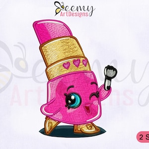 May include: Embroidered design of a pink lipstick character with a gold top and hearts. The character has a smiling face with large eyes and is wearing gold shoes. The text "2 SIZES" is visible in the bottom right corner.