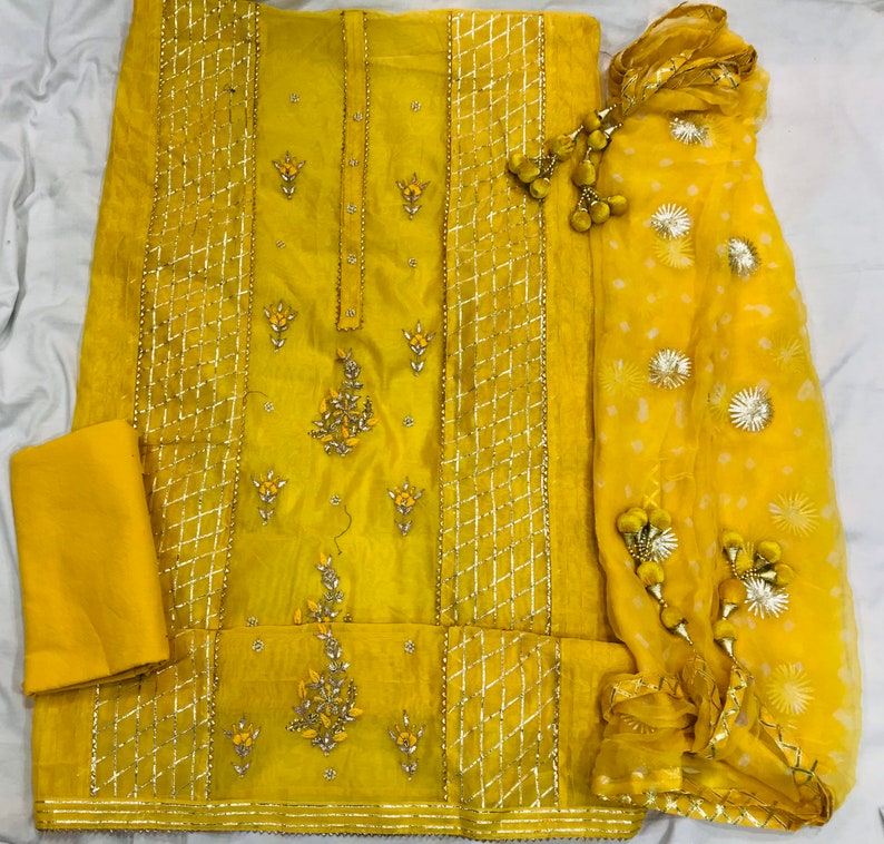 Hand Embroidered Salwar Kameez DupattaBeautiful Panel Embroidery In Yellow Color ChanderiChiffon Gota Work And Bhandani Print Dupatta