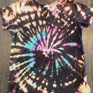 Reverse black tie dye T shirt for women in rainbow swirl, rainbow tie-dye shirt for women, rainbow tie-dye T-shirt for women, reverse tiedye