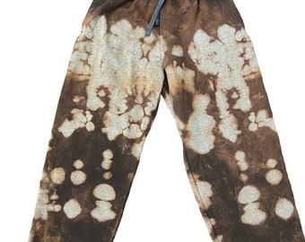 Bleached dye , bleach tie dye, soft black cotton sweatpants, unisex sizes S-2 XL, front pockets, drawstring closure, closed bottom fit