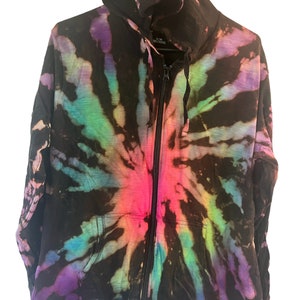 May include: Black zip-up hoodie with a tie-dye pattern in shades of pink, purple, blue, and green.