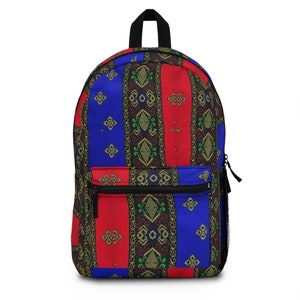 May include: A blue, red and black patterned backpack with a zipped pocket on the front.
