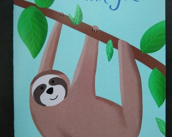 May include: A brown sloth hangs upside down from a branch with green leaves. The text "I like hanging with you" is written in blue on a light blue background.