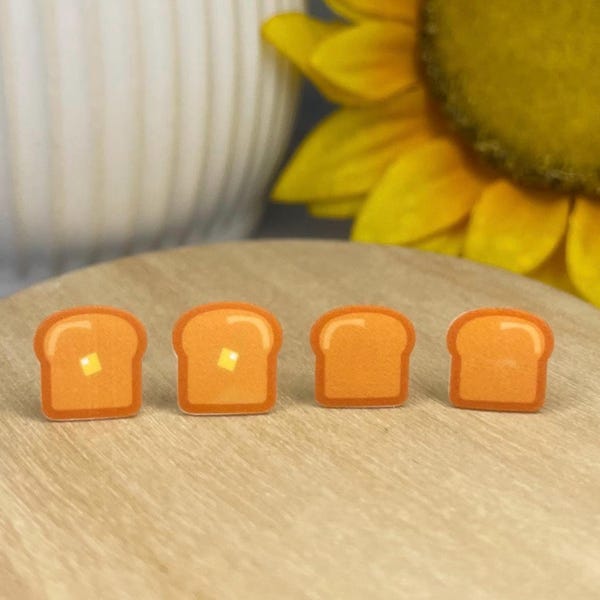 Pendientes de botón con forma de tostada de pan, de plástico termorretráctil, con cierre de mariposa.