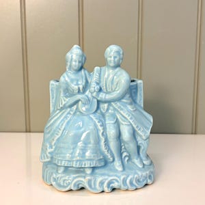 Vintage Cameron Pottery powder blue indoor planter with courting Colonial couple. 1962