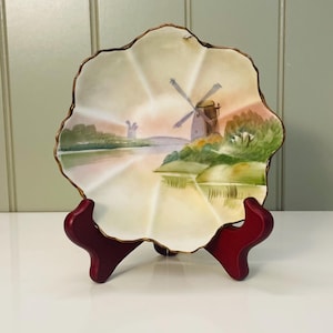 Vintage/antique hand painted Nippon ceramic wavy ring dish/trinket tray. Original stamp signature on back. Windmill and river design.