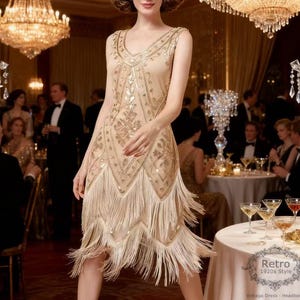 May include: A beige flapper dress with intricate beadwork and fringe detailing. The sleeveless dress has a V-neck and a decorative pattern. The image is labeled "Retro 1920s Style" and shows a vintage dress.