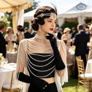 May include: A black sleeveless top paired with a multi-strand pearl capelet, black opera-length gloves, and a jeweled pearl headband. The ensemble features a high pearl choker collar and cascading pearl fringe detailing over the shoulders.