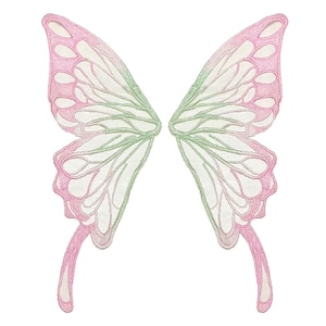 May include: A pair of butterfly wings in shades of pink, white, and green. The wings are symmetrical, with a delicate, lacy appearance. The edges are outlined in pink, and the veins are a soft green. The wings are designed to be worn.