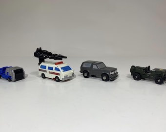 Vintage GoBots & Transformers Lot: Geeper Creeper, Scratch, Hans Cuff, First Aid