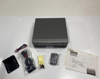 Reproductor/grabador de vídeo VHS multimedia móvil para coche Clarion VDH910 con mando a distancia (sin probar)