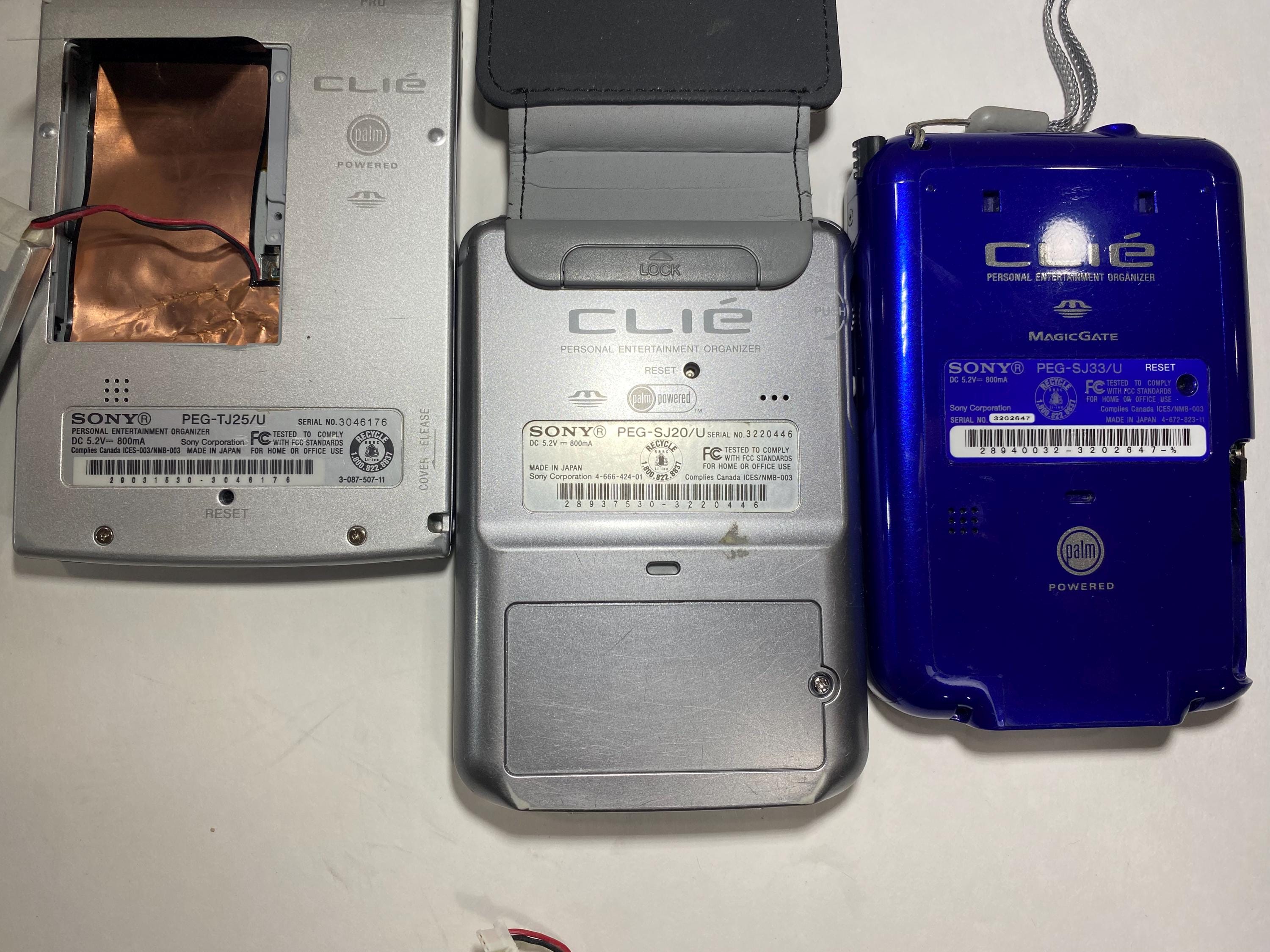 Lot of 3 Sony CLIE Pdas Peg-tj25/u, Peg-sj20/u, Peg-sj33/u, for