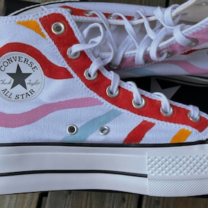 Custom Painted Converse in pink, red, blue, and yellow