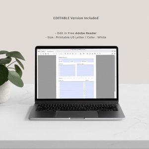 Pu&ograve; includere: Un computer portatile che mostra un modello di pianificatore di progetti stampabile in Adobe Reader. Il modello &egrave; bianco con linee blu chiaro e il testo "Project Planner" in alto. Il testo "Editable Version Included" &egrave; visualizzato sopra lo schermo del laptop.