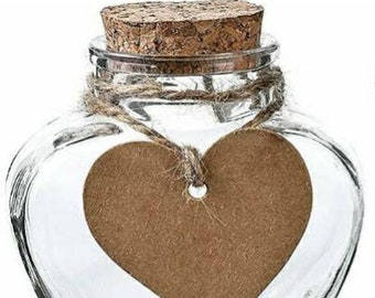 5oz. glass heart-shaped jars. You may purchase empty, or with personalization or intentions