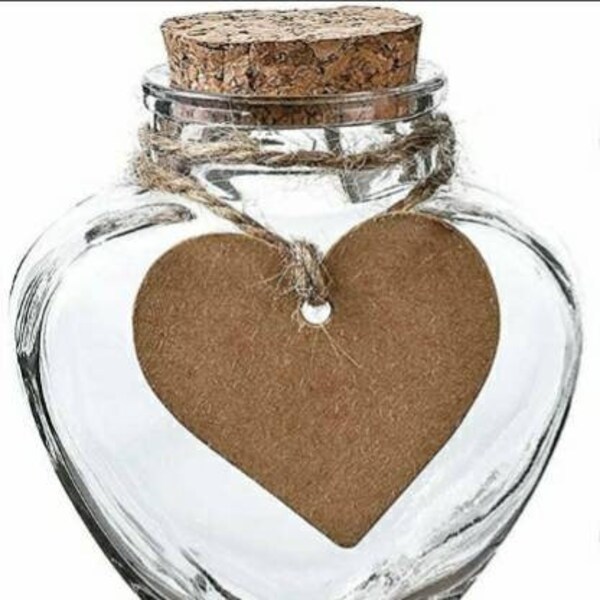 5oz. glass heart-shaped jars. You may purchase empty, or with personalization or intentions