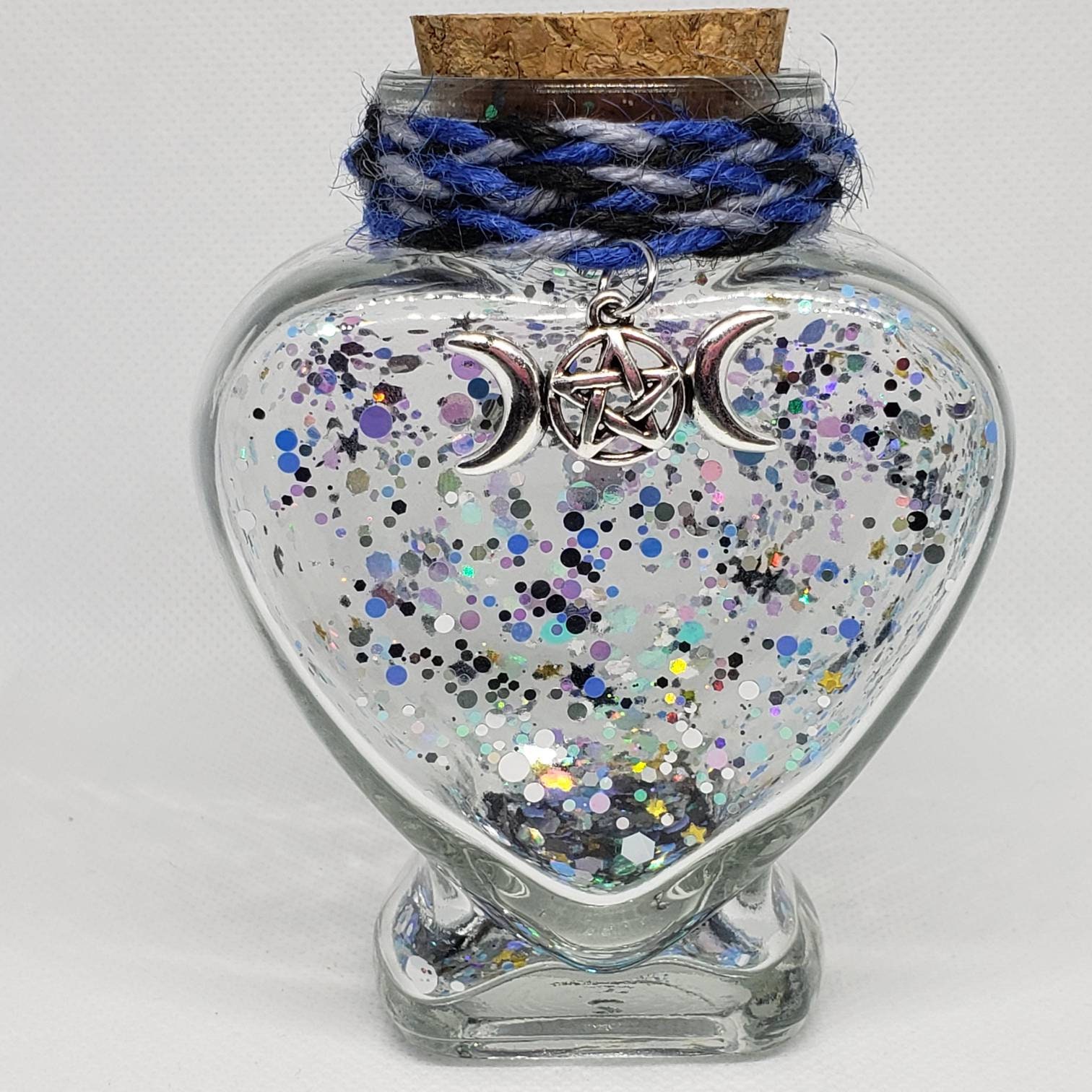 5oz. glass heartshaped jars. You may purchase empty or with Etsy