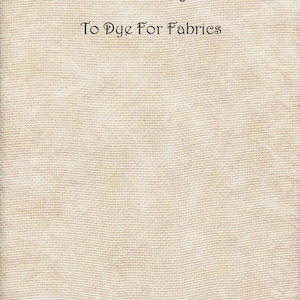 May include: A piece of light beige 14 ct Aida Zweigart fabric with a mottled texture. The text printed on the fabric reads: Café Au Lait, shade 3, 14 ct Aida Zweigart, To Dye For Fabrics. The fabric has a visible grid pattern for cross-stitching.