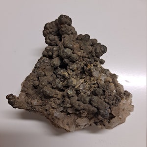 Medium Goethite on Quartz mineral specimen
