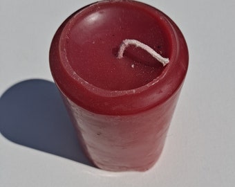 Medium rose geranium or patchouli red scented candle
