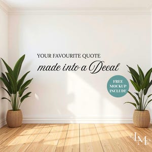 May include: A white wall with the text "YOUR FAVOURITE QUOTE made into a Decal". Two large potted plants in woven baskets are either side of the wall. A teal circle with the words "FREE MOCKUP INCLUDE" is on the wall.