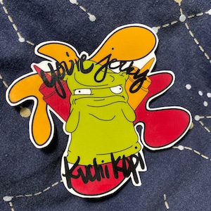Melted green light up creature sticker burger man decal sticker for computers and electronics