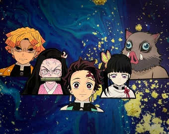 May include: Five anime characters from the Demon Slayer series. The characters are Tanjiro Kamado, Nezuko Kamado, Zenitsu Agatsuma, Inosuke Hashibira, and  Kanao Tsuyuri. The characters are depicted in a colorful, cartoon style.