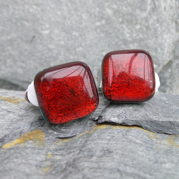 Hand made ruby red fused glass clip-on earrings made using dichroic glass