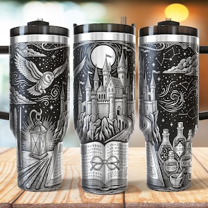 May include: A stainless steel tumbler featuring a black and white wrap-around illustration of a castle, a flying owl, a lantern, wands, an open book with round glasses, and potion bottles labelled Elixir and Mana under a starry night sky.