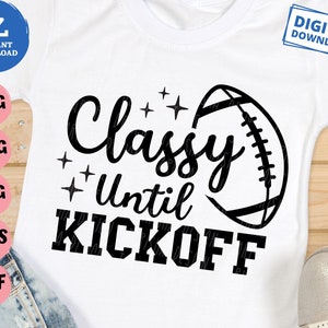 May include: A white t-shirt with a black graphic that says "Classy Until Kickoff" with a football graphic.