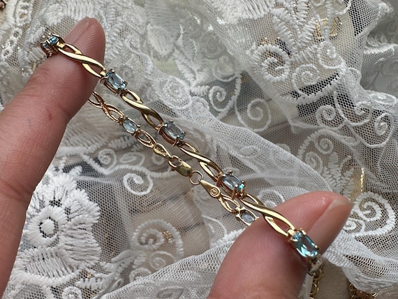 Solid Gold Vintage Blue Topaz Infinity Tennis Bra… - image 1