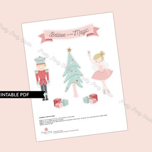 Puede incluir: Hoja de manualidades PDF imprimible con un cascanueces, una bailarina, un &aacute;rbol de Navidad y regalos. La hoja incluye el texto "Believe in the Magic".