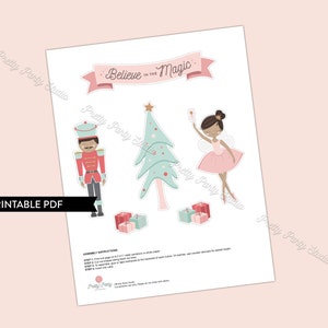 May include: Printable PDF craft activity featuring a nutcracker, a ballerina, a Christmas tree, and presents. The text "Believe in the Magic" is on a banner.
