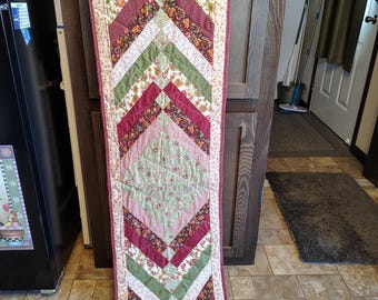 Homemade quilted table runner (burgundy, beige and green)