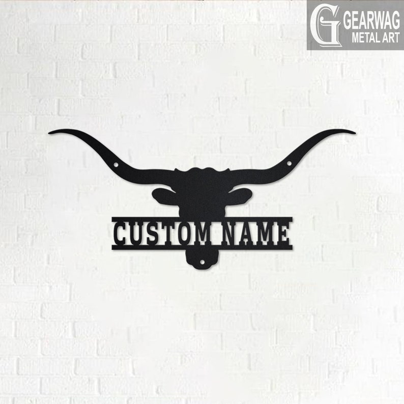 May include: Black metal silhouette of a longhorn steer head with large horns and a nameplate that reads "CUSTOM NAME".