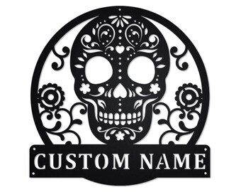 May include: Black metal sign with a circular design featuring a sugar skull with floral details and the text "CUSTOM NAME".