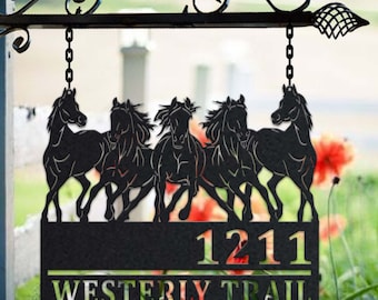 May include: Black metal silhouette of five horses running, with a black sign below with the house number 1211 and the street name "Westerly Trail" in white lettering.