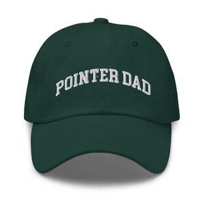 May include: A dark green baseball cap with white embroidered text that reads "POINTER DAD".
