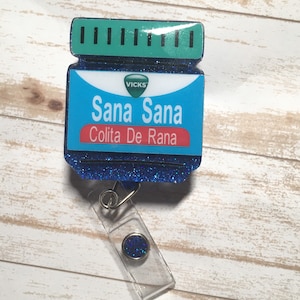 Sana Sana interchangeable glitter badge Reel