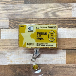 Epinephrine interchangeable glitter badge reel