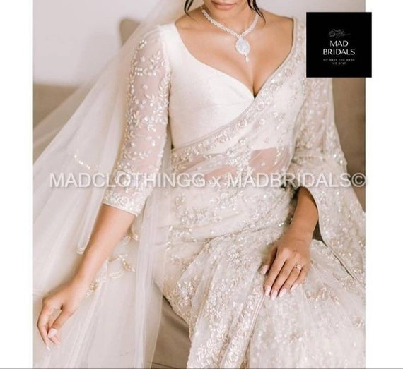Kalyan Silks - Kalyan Silks #White #Classics #Exclusive #White #Wedding # Sarees & #Gowns | Facebook