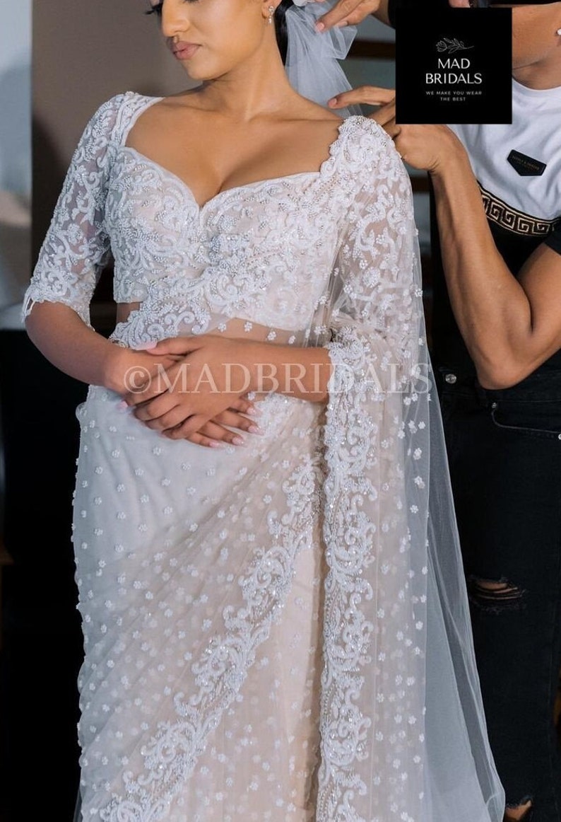 Off White Mirror and Pearl Drop Bridal lehenga set with Veil main image 0