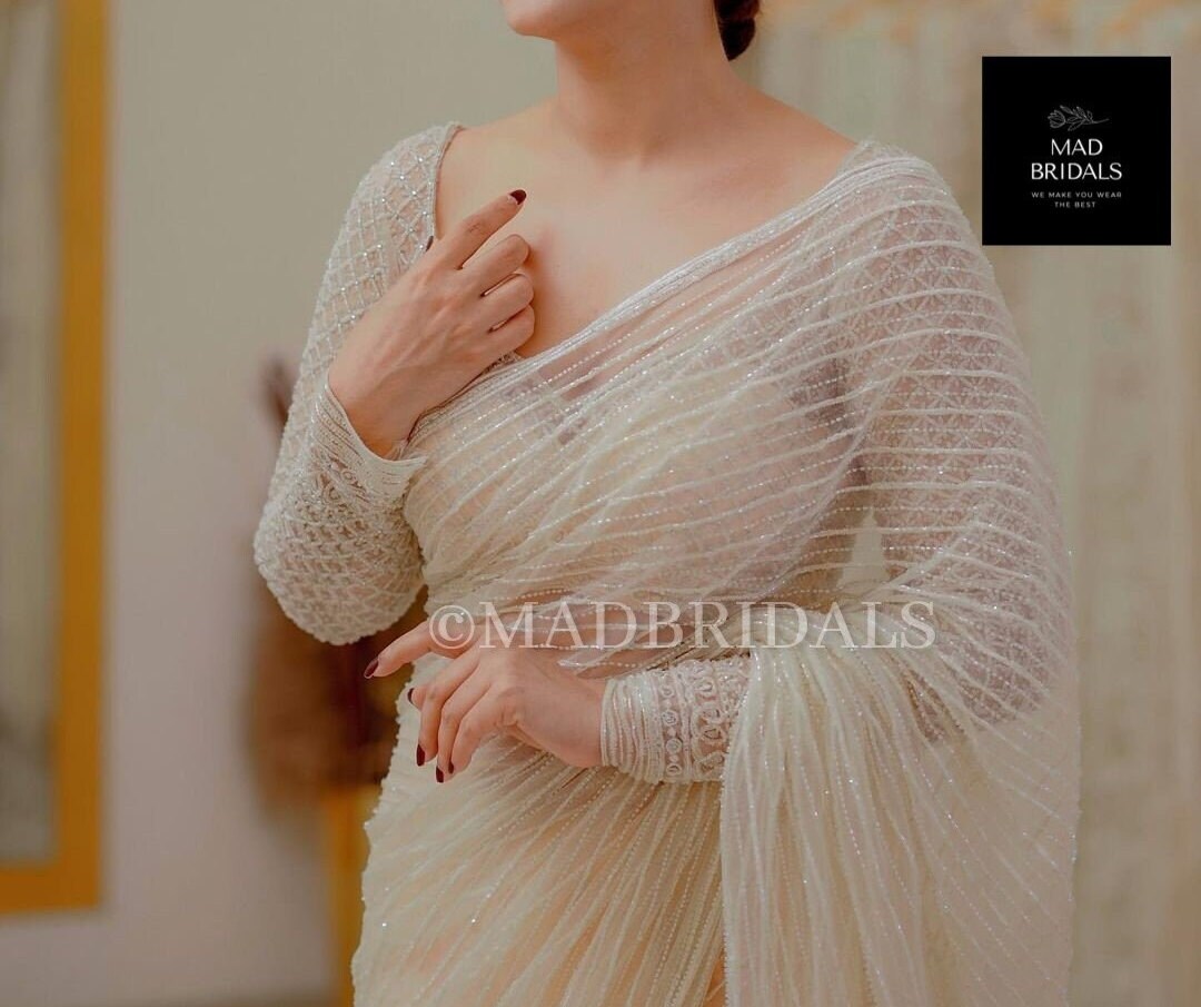 Heavy pearl bridal saree best sale