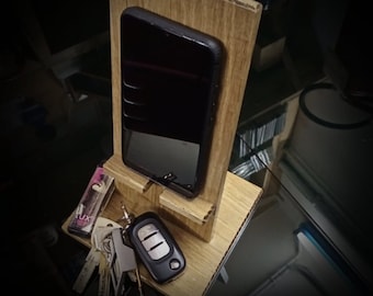 Mobile phone holder with solid wood storage