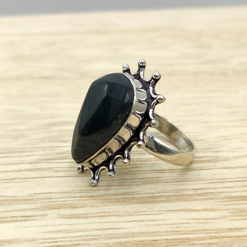 Original ethnic bloodstone ring with character design