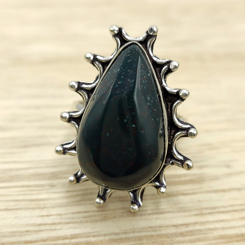 Original ethnic bloodstone ring with character design