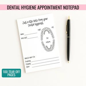 May include: A white dental hygiene appointment notepad with the text "DENTAL HYGIENE APPOINTMENT NOTEPAD" at the top. The notepad includes sections for name, next appointment, and a diagram of teeth. A black pen with gold accents rests beside the notepad.